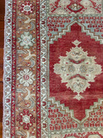 Dimensions: 3'6" x 5'7"  Palette includes pistachio, mint, bronze, ecru and ruby.  Vintage Turkish Anatolian rug c.1970, hand knotted of wool.&nbsp;  This rug is not symmetrical, as you can see from the photos. The length measurement is at the longest point. The beauty of a hand made rug!&nbsp;