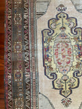 Dimensions: 4'5" x 8'1"  Palette includes navy, brunette, caramel, golden beige, charcoal, flaxen and deep red.&nbsp;  Vintage Turkish Anatolian rug c.1970, handmade of wool.&nbsp;