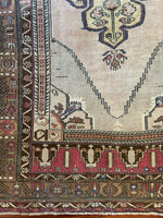 Dimensions: 4'5" x 8'1"  Palette includes navy, brunette, caramel, golden beige, charcoal, flaxen and deep red.&nbsp;  Vintage Turkish Anatolian rug c.1970, handmade of wool.&nbsp;