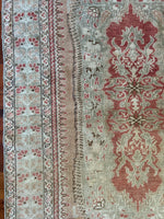 Dimensions: 4.5' x 6'2.5"  Palette includes blush, rouge, pistachio and walnut.  Vintage Turkish Anatolian rug c.1970, hand knotted of wool.&nbsp;