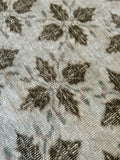 Measures 3'8" x 6'6"  Palette includes pine green, cedar and cream.   Vintage Turkish c.1970, handmade of wool. 