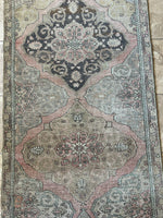 <p>Dimensions: 3'8.5" x 11'10"</p> <p>Palette includes muted rouge, sage, pistachio, slate blue, mocha, butter, electric blue.</p> <p>This runner is hand knotted of wool, it has a low pile, drapery feel.&nbsp;</p> <p>Vintage Turkish c.1970</p>