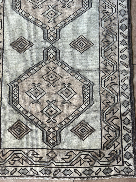 <p>Dimensions: 2’8” x 4’1"</p> <p>Palette includes chocolate, cream, nude and a light grey.</p> <p>This rug was knotted by hand using wool. Vintage Turkish Anatolian c.1970.</p>