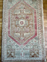Dimensions: 1'8" x 3'  Palette includes pink, grey, light and dark caramel, and sage.   Vintage Turkish c.1970. Handmade of wool. 