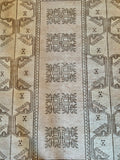 Dimensions: 3'10.5" x 6'2.5"  Palette includes soft pink undertones, wheat, and walnut.   A hand woven vintage Turkish rug c.1970. Low pile, wool. 
