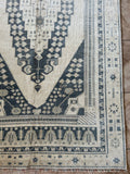 Dimensions: 4'5" x 9'1.5"  Palette includes navy, gray and wheat.  This is a vintage Turkish rug c.1960. Woven by hand of wool.   This size is great for an entryway, kitchen, bathroom, or at the foot of a bed! 