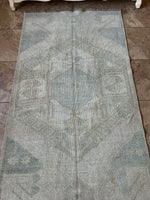 Dimensions: 3'5" x 10'9"  Palette includes a blue/green, silvery taupe, and light camel.  Vintage Turkish Rug c.1970. Hand-knotted from wool.   Runners are great for hallways, kitchens, bathrooms, and more! 