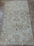 Dimensions: 4'1.5" x 7'1.5"  Palette includes bright blue, ivory, camel and pecan.   Hand-knotted vintage Turkish rug c.1960. Wool.   Such a rare all-over design! Size would work well in a foyer, primary bathroom, and kitchen. 