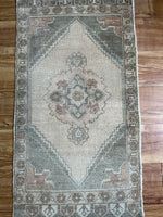 Dimensions: 1'8 x 3'  Palette includes a silvery sage, copper and wheat.  Vintage Turkish c.1960, handmade of wool. 