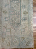 Dimensions: 1'9" x 3'6.5"  Palette includes a soft pink, blue/green, golden mustard and light gray.   Vintage Turkish rug handmade of wool c.1960.
