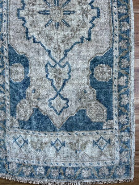Dimensions: 1'7.5 x 3'7  Palette includes blue tan and flaxen.  Vintage Turkish c.1970, handknotted of wool. 