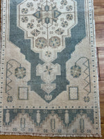 Dimensions: 1'6 x 3'7.5  Palette includes steel blue, brown and nude.  Vintage Turkish c.1970, hand knotted of wool. 