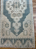 Dimensions: 1'6 x 3'7.5  Palette includes steel blue, brown and nude.  Vintage Turkish c.1970, hand knotted of wool. 