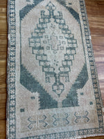 Dimensions: 1'9.5 x 3'6.5  Palette includes steel blue and nude.   Vintage Turkish c.1970, hand knotted of wool. 