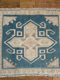 Dimensions: 2' x 1'11"  Palette includes steel blue and wheat.  Vintage Turkish c.1970, hand knotted of wool. 