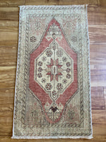 Dimensions: 1'8.5" x 3'1"  Palette includes a soft rosewood, sand, taupe, and charcoal.  Vintage Turkish approximately 50 years old. Wool.  