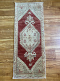 Dimensions: 1'4.5" x 3'5"  Palette includes rosewood, light grey, and off-white.   Vintage Turkish approximately 50 years old. Wool. 