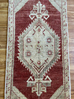 Dimensions: 1'4.5" x 3'5"  Palette includes rosewood, light grey, and off-white.   Vintage Turkish approximately 50 years old. Wool. 