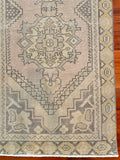 Dimensions: 2'9" x 9'  Palette is soft and includes a blue/gray, yellow, and a light crepe.   Vintage Turkish approx. 60 years old, handmade of wool.   These photos were taken indoors with overhead lights on. 